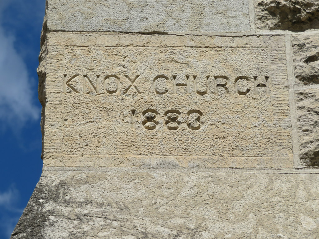 The cornerstone from the 3rd Knox building is on the southwest tower.