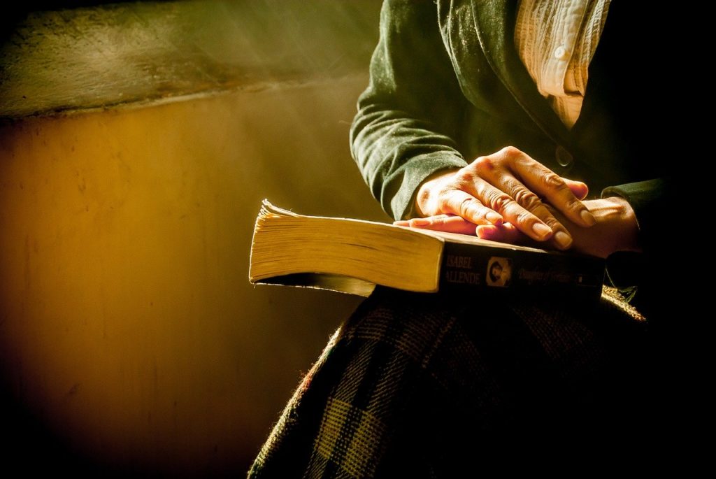 book, hands, reflecting